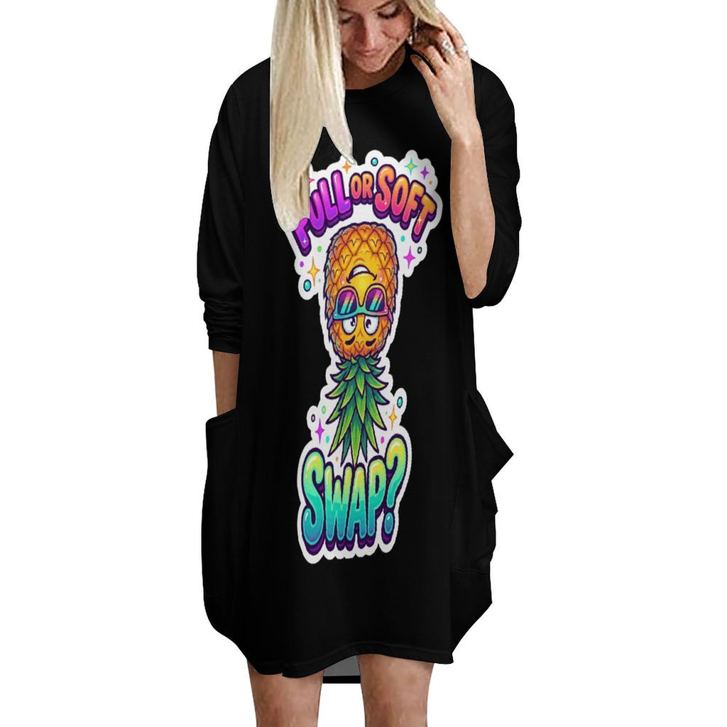 A woman wearing a black long-sleeve tunic dress with a colorful graphic of a pineapple wearing sunglasses and the text 'JULL OR SOFT SWAP?' on the front, set against a plain white background.