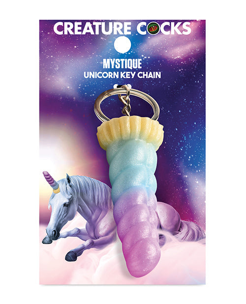 Unicorn-themed keychain with packaging featuring a unicorn and colorful design.