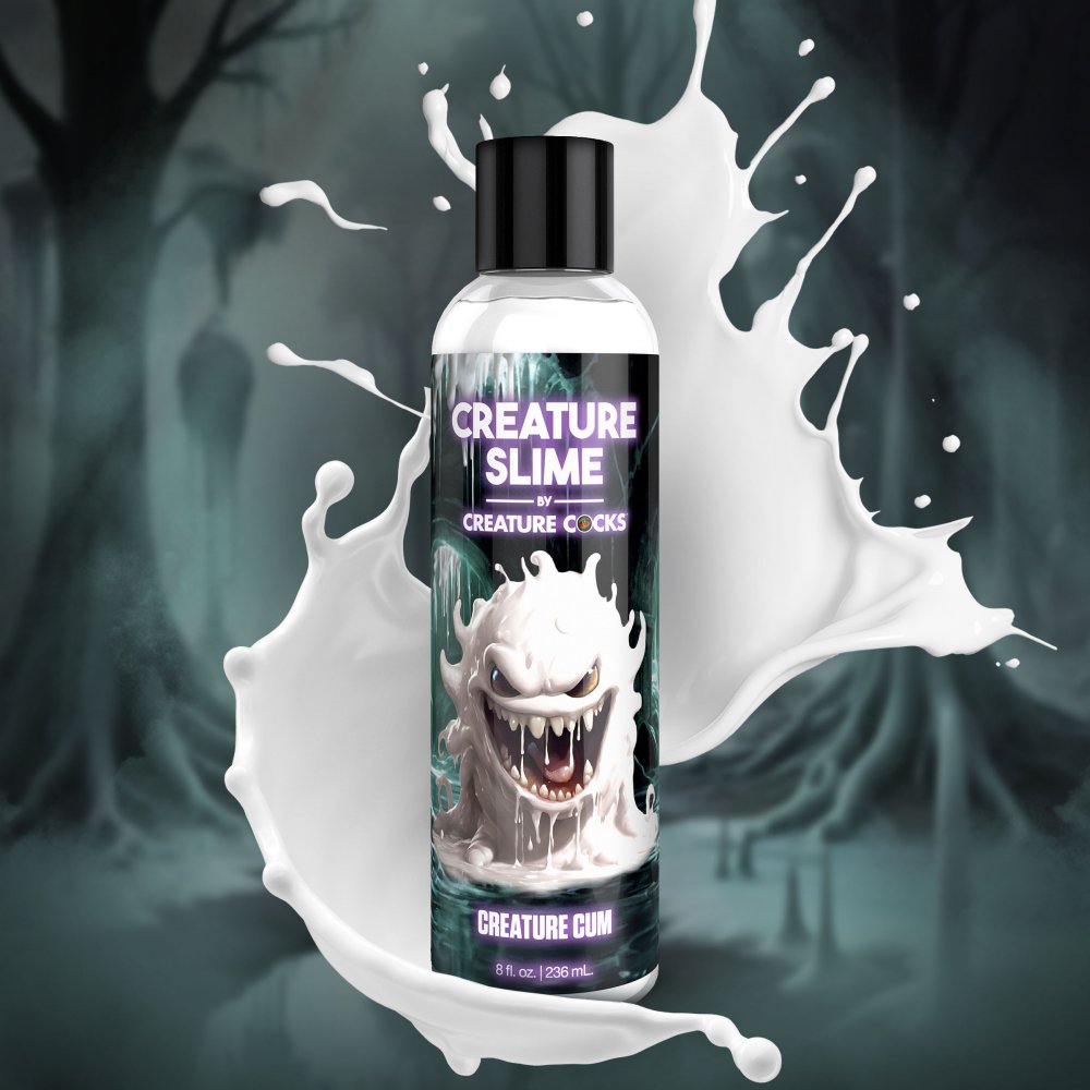 Bottle of Creature Slime with a dark background and white splashes