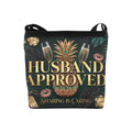 Colorful swinger lifestyle inspired tote with Husband Approved on the front of it in front of a diamond encrusted pineapple.