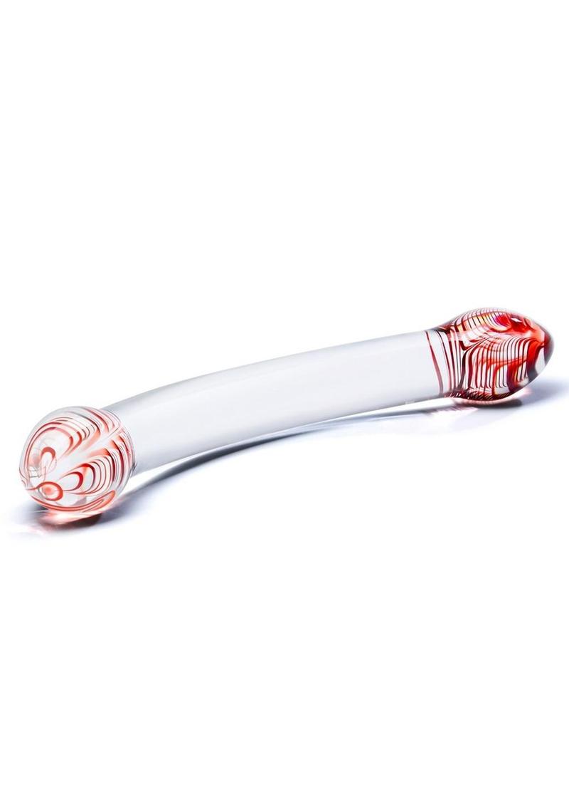 Glass smoking pipe with red and white design on a white background
