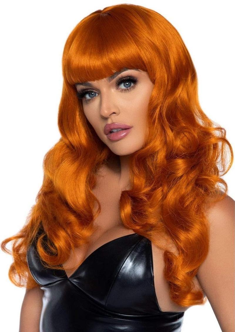 Woman with long orange wig and black top on a white background