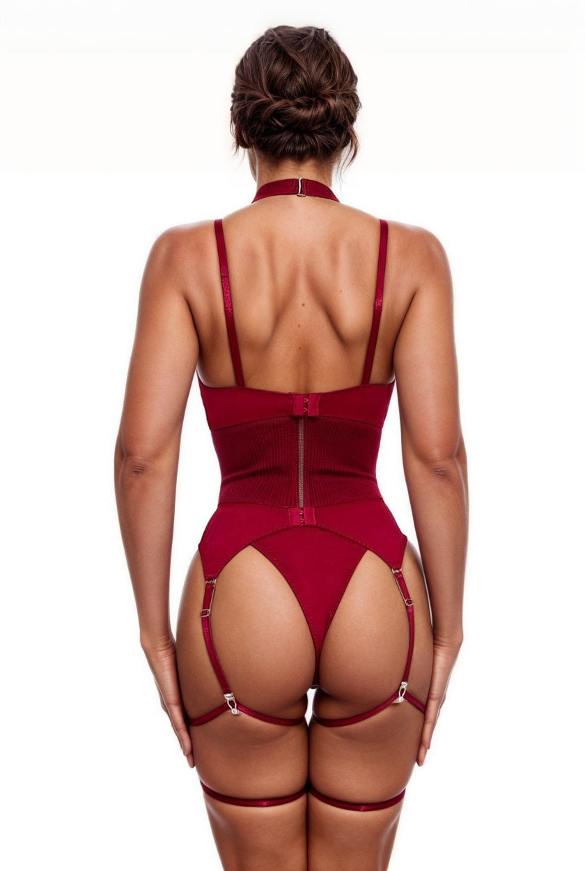 Red lingerie set with garter straps on a white background